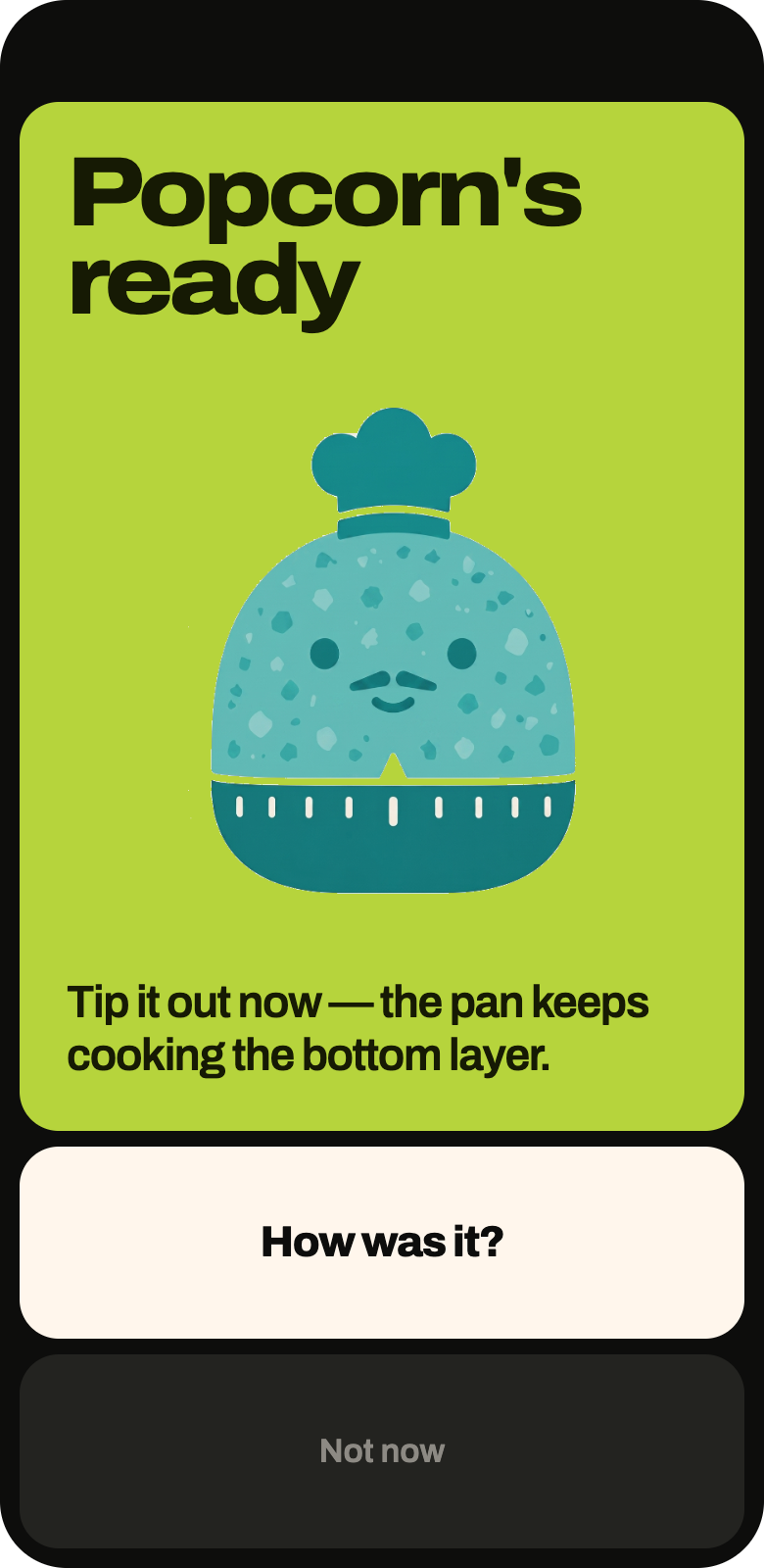 The done screen: a lime board reading Popcorn's ready, Sensei the kitchen timer with a chef's hat beneath it, and the instruction to tip it out now because the pan keeps cooking the bottom layer.